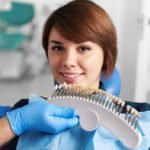 woman having her teeth whitened at the dentist