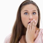 woman needs emergency dentist appointment