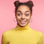Excited smiling young woman