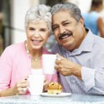 Senior Couple Enjoying Snack Outside