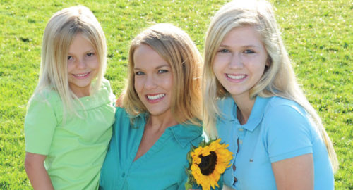 Woman & children smiling