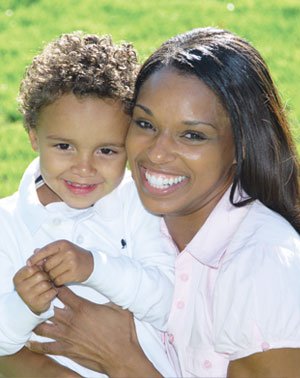 Woman smiling with child